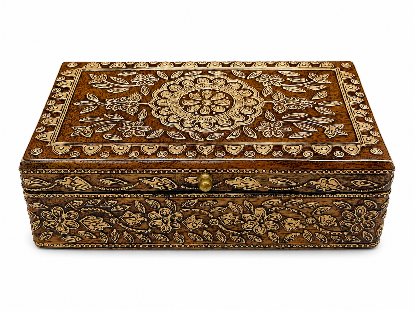 Raised front view showing the ornate lid and floral border