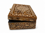 Side angle of ornate floral storage box with hinged lid