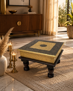 Antique gold puja chowki styled in a modern home interior