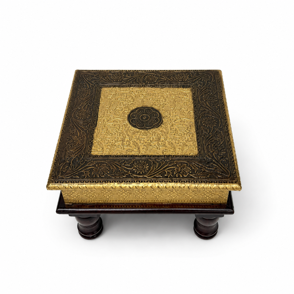 Top view of square embossed puja chowki with central floral medallion