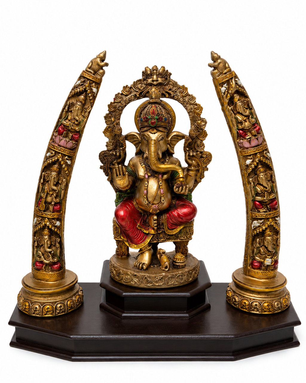 Front view of antique gold Ganesha idol with ornate tusk-style side arches