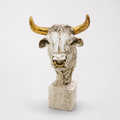 Antique ivory and gold bull head sculpture with nose ring, front view