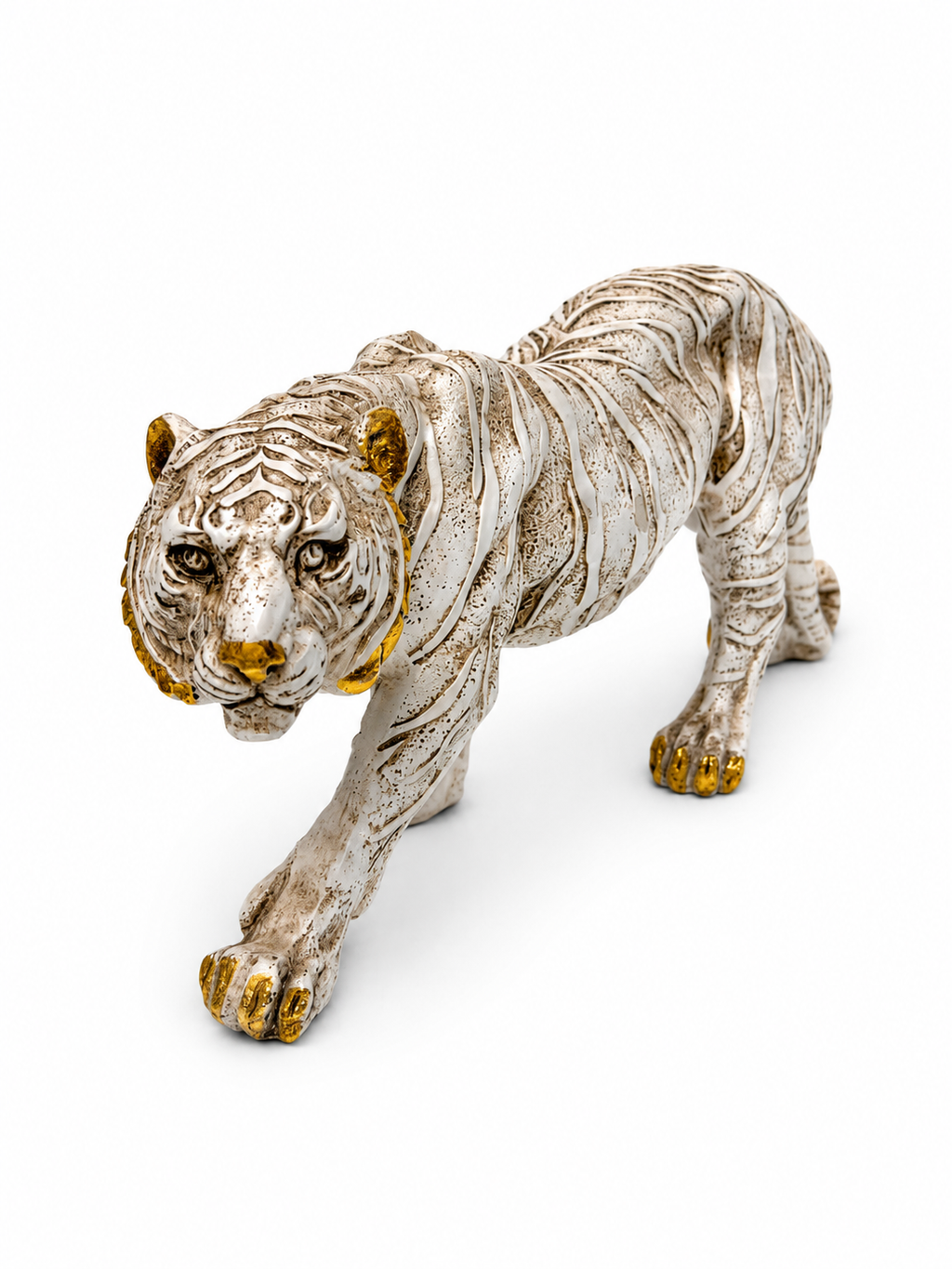 Front angled view of prowling white tiger decorative sculpture