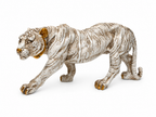 Side view of antique white tiger decorative sculpture with gold-toned accents