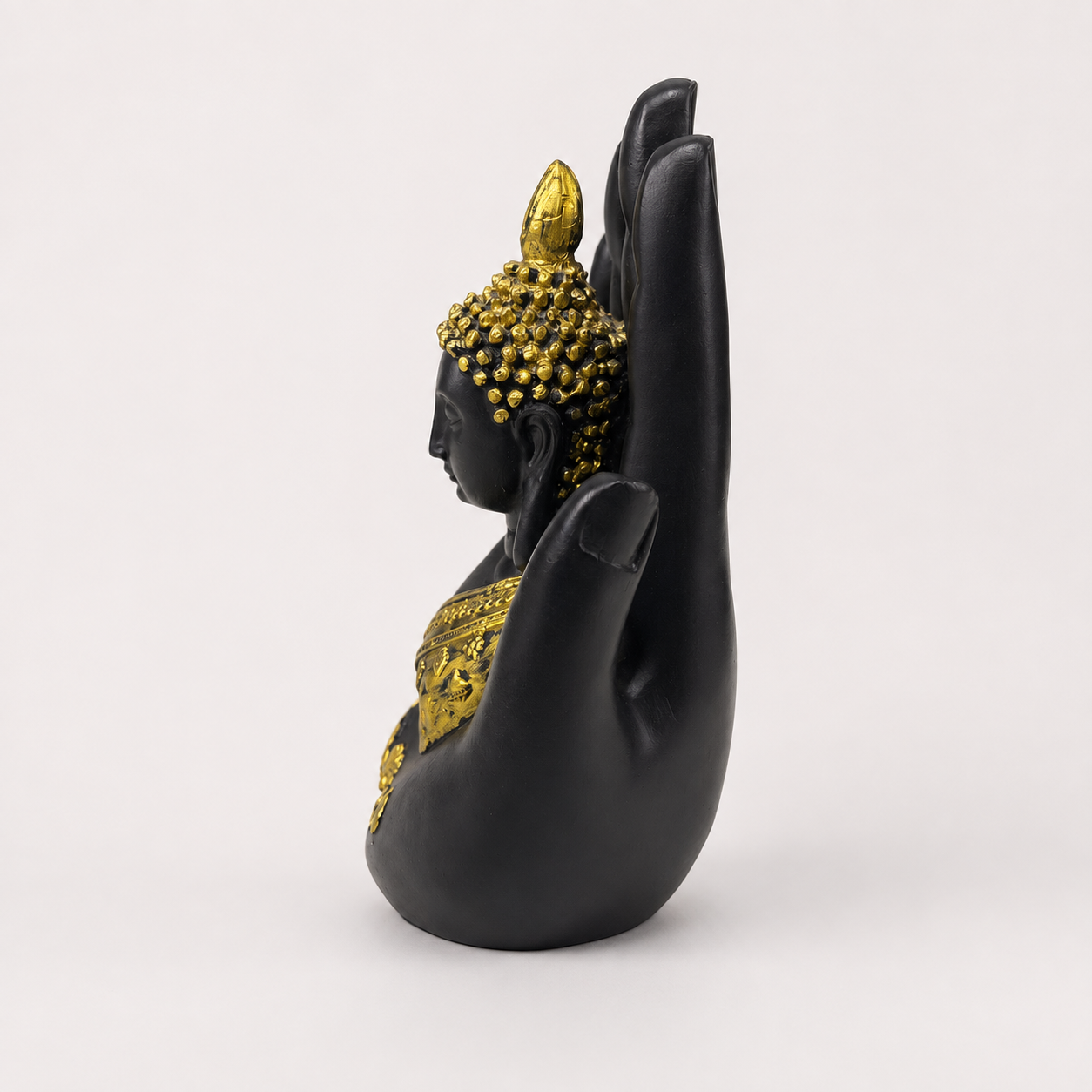 Black and gold Blessing Palm Buddha sculpture, left-side view