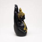 Black and gold Blessing Palm Buddha sculpture, right-side view