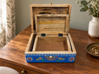 Cobalt Bloom set of two keepsake boxes with both lids open on a wooden dressing table