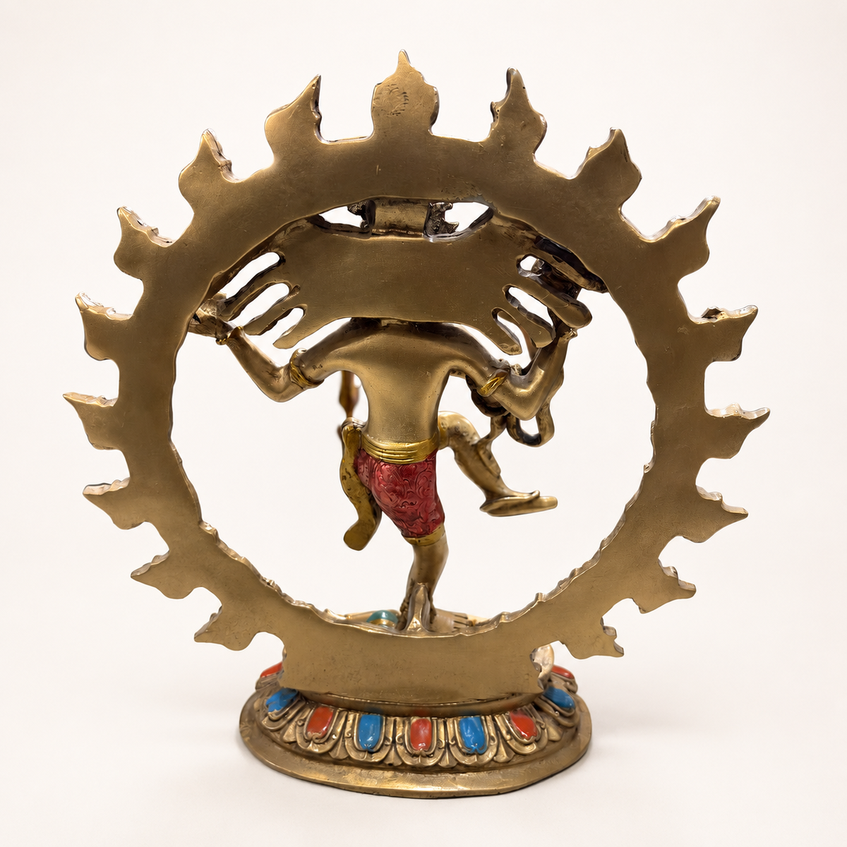 Rear view of the Nataraj Shiva idol showing the circular halo and decorated pedestal