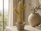 Desert Gleam gold-toned cactus decorative sculpture styled on a console