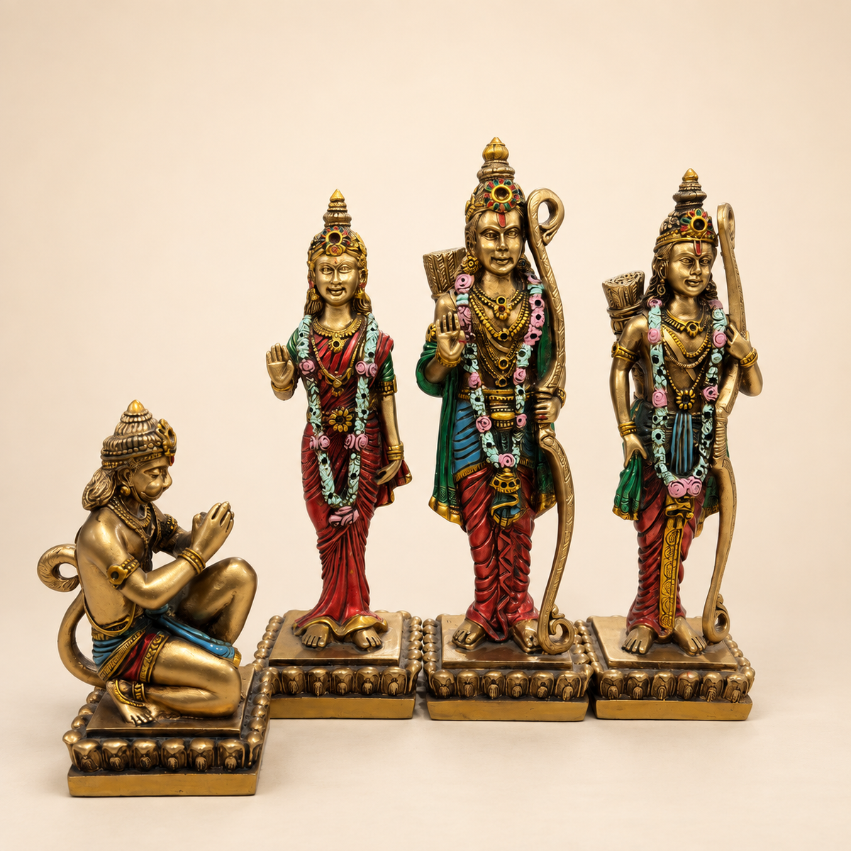 Ram Darbar set with Rama, Sita, Lakshman and kneeling Hanuman in a gold-tone finish with multicoloured details, front view