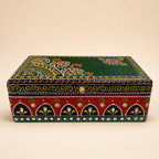 Emerald Darbar decorative keepsake box with a deep green lid, red patterned sides and reflective accents, front view