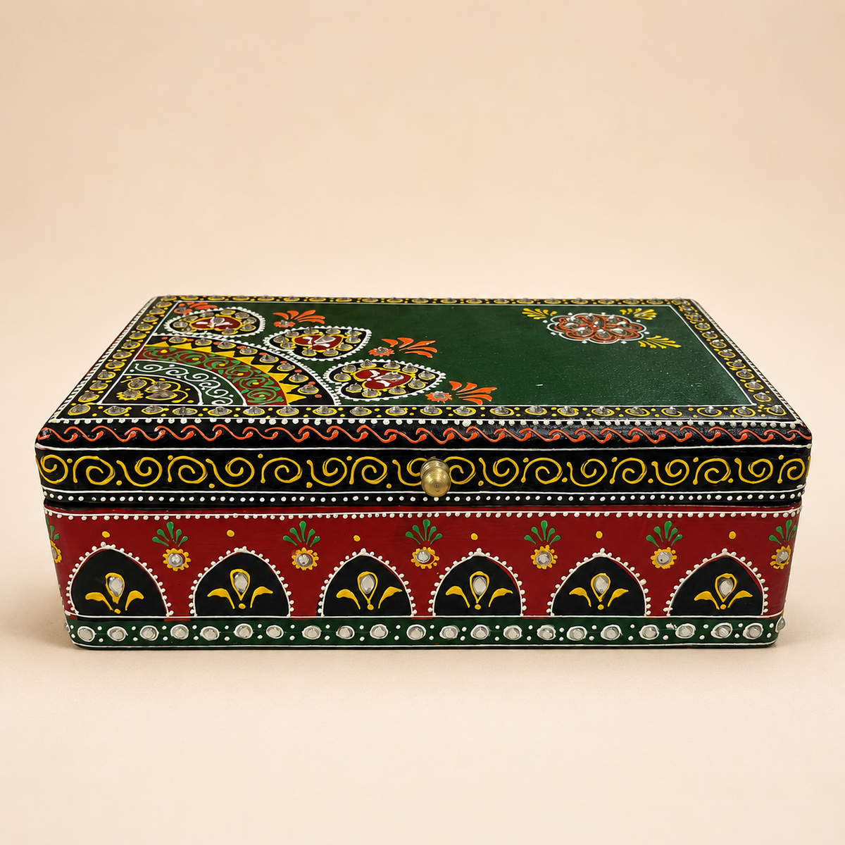 Emerald Darbar decorative keepsake box with a deep green lid, red patterned sides and reflective accents, front view