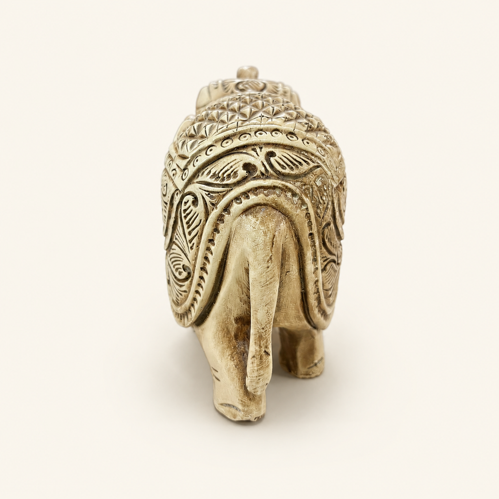 Floral Majesty ivory and gold elephant sculpture, rear view