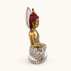 Antique gold, ivory and burgundy halo Buddha sculpture, side view