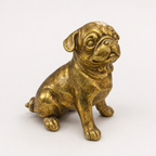 Golden sitting pug decorative sculpture, angled view