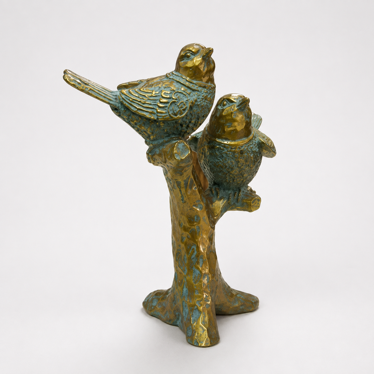 Antique teal and gold pair of songbirds on a branch sculpture, front view