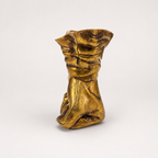 Golden Resolve sculpted hand decorative accent, angled view