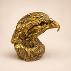Golden Sentinel eagle bust sculpture in an antique gold-tone finish, showing layered feathers and a hooked beak