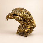 Opposite profile of the Golden Sentinel eagle bust with detailed plumage and a textured rock-effect base