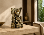 Heritage Grace Ganesha idol displayed on a stone console in a warm sunlit interior
