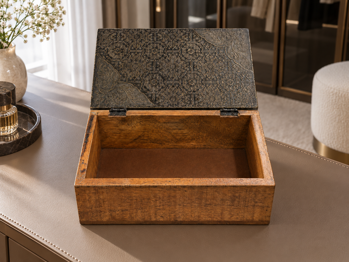 Open wooden keepsake box styled on a dressing table, showing its undivided interior