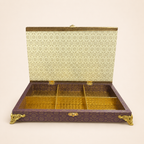 Open Ivory Bloom jewellery organiser showing six compartments and patterned gold-tone interior