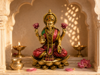 Lotus Abundance Lakshmi idol in a warm arched prayer alcove with lamps and pink lotus petals