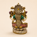 Rear view of the Lotus Radiance Lakshmi idol showing flowing hair, a floral halo, green blouse and patterned pink garments