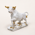 Majestic ivory and gold bull sculpture, front three-quarter view