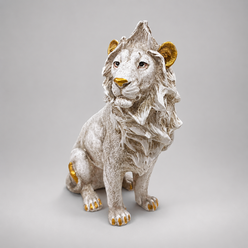 Majestic ivory and gold seated lion decorative sculpture, front view