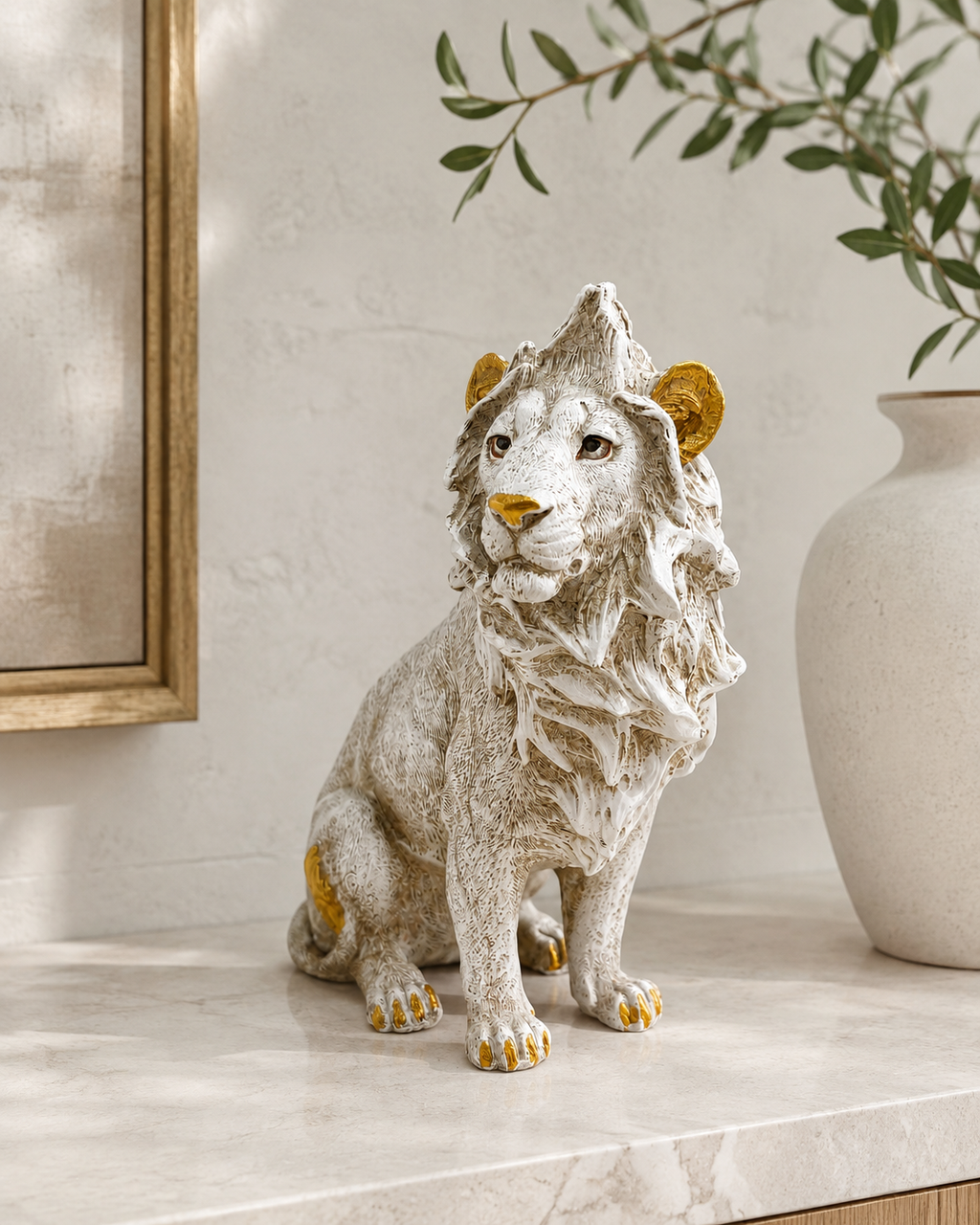 Majestic ivory and gold lion sculpture styled on a light console