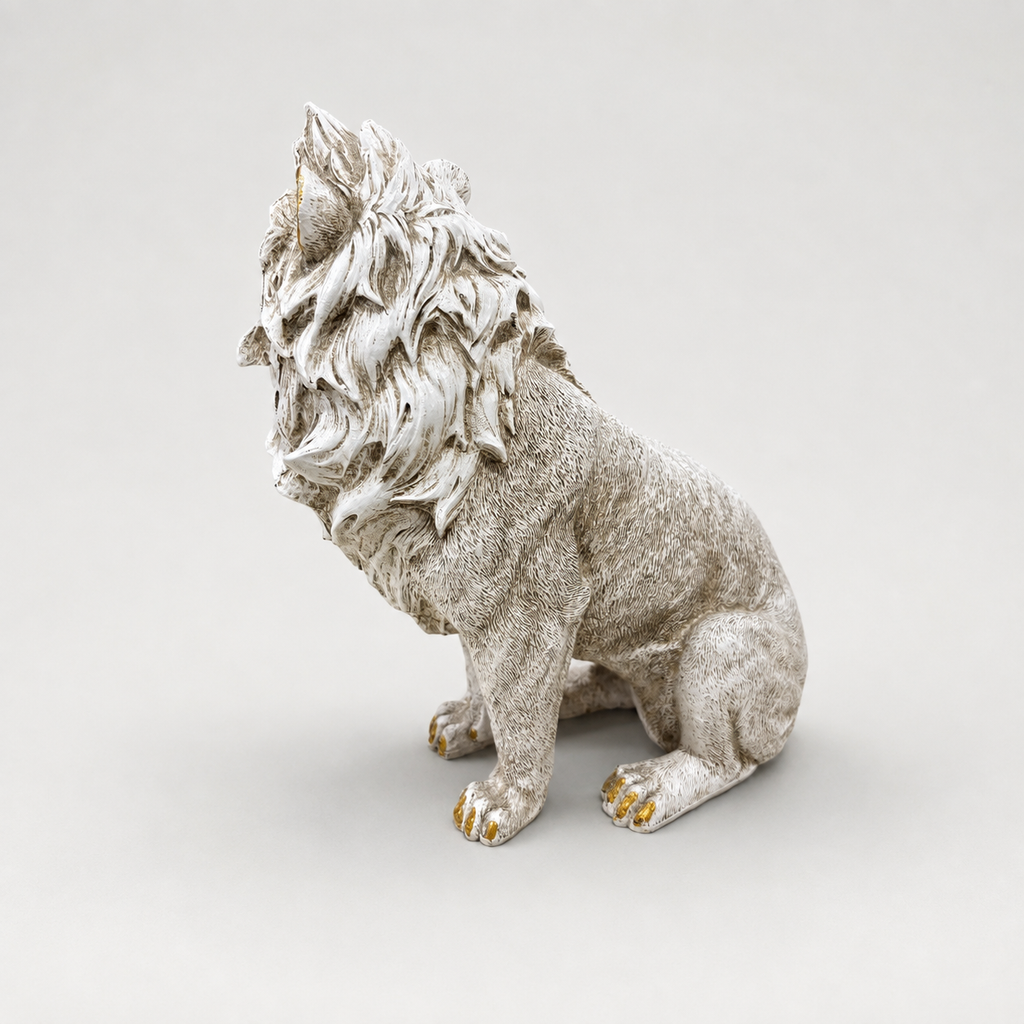 Majestic ivory and gold seated lion decorative sculpture, rear angled view