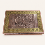 Mayur Darbar jewellery organiser box with a copper-tone peacock lid and gold-tone geometric borders