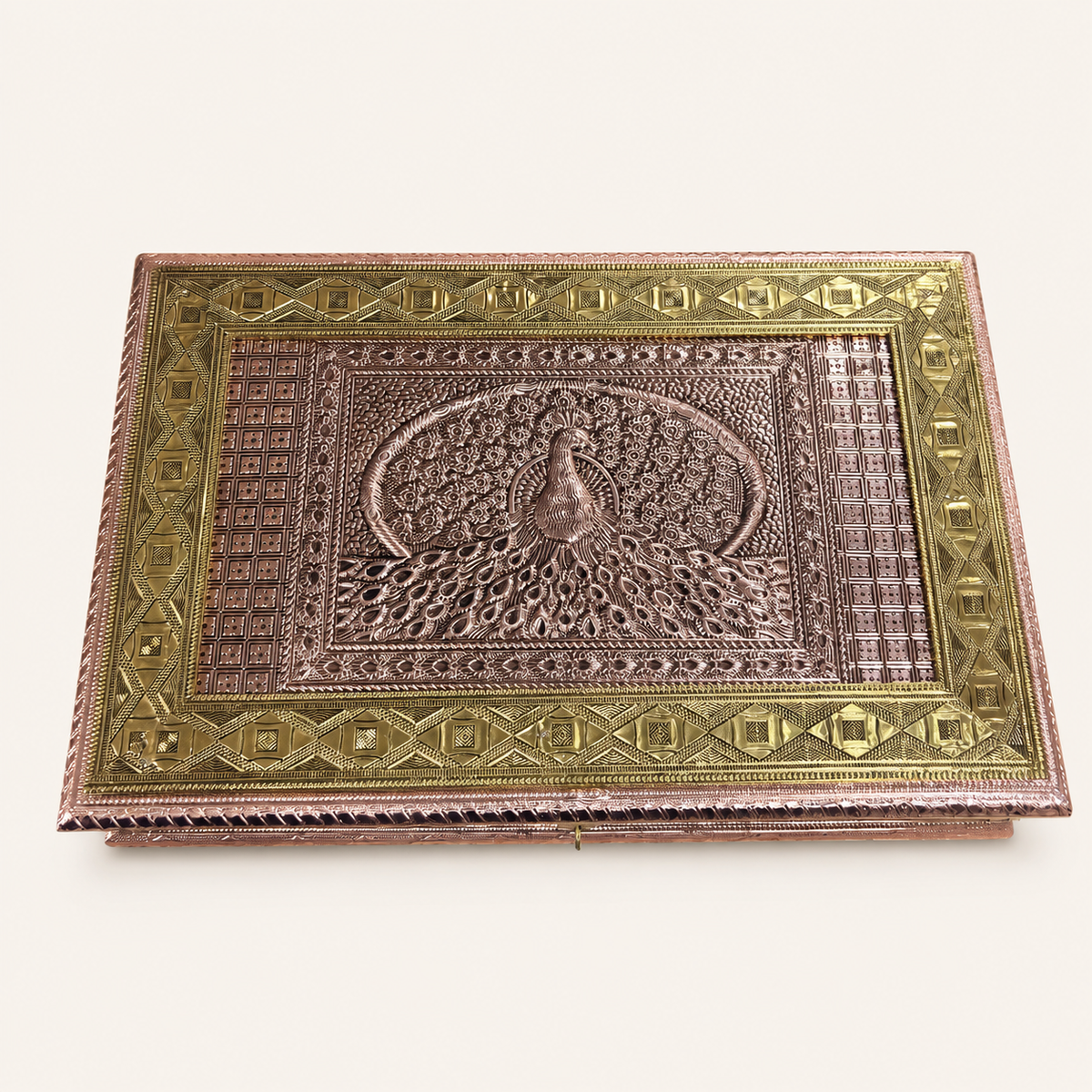 Mayur Darbar jewellery organiser box with a copper-tone peacock lid and gold-tone geometric borders