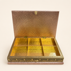 Open Mayur Darbar peacock jewellery box showing six gold-tone compartments and a patterned copper-tone lid interior