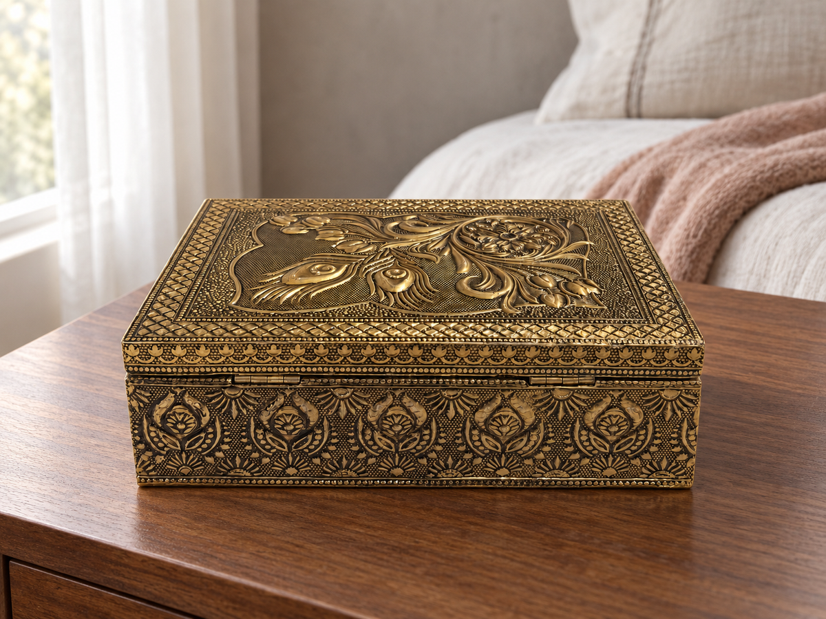 Mayura Bloom antique gold tone jewellery box styled on a walnut toned nightstand