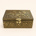 Mor Pankh antique gold tone jewellery box with peacock feather and floral lid, patterned sides and curved front clasp