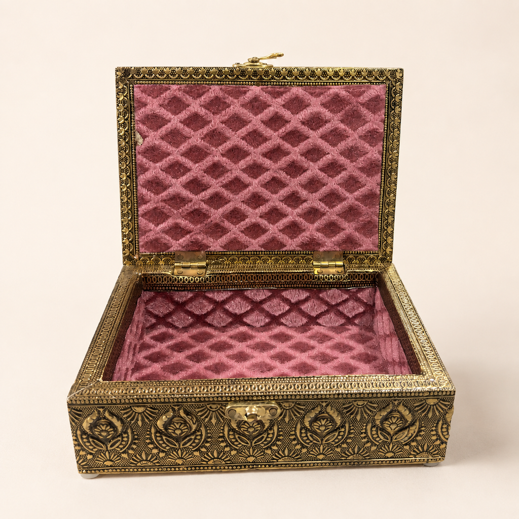 Open Mor Pankh jewellery box with a rose coloured patterned interior and single compartment