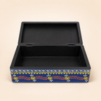 Neel Mandala keepsake box with hinged lid open, showing the black interior and storage compartment