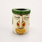 Nomad Bloom ivory and green decorative face pen stand, front view
