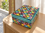 Phool Mosaic floral keepsake box displayed on a sunlit oak console