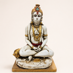 Quiet Devotion meditating Hanuman idol in an ivory-tone and gold-tone finish with red attire, front view