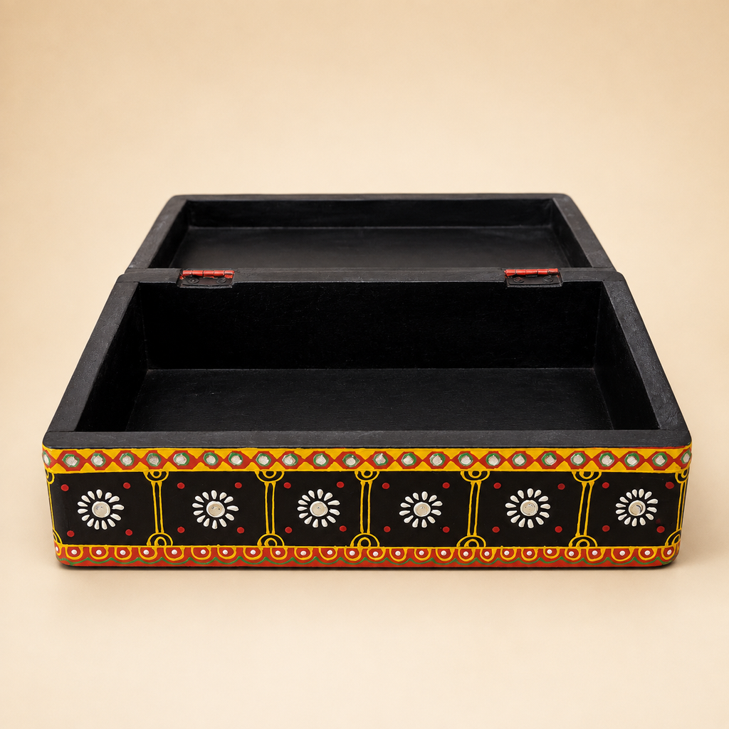 Open Rang Jyoti keepsake box showing its hinged lid and single black compartment