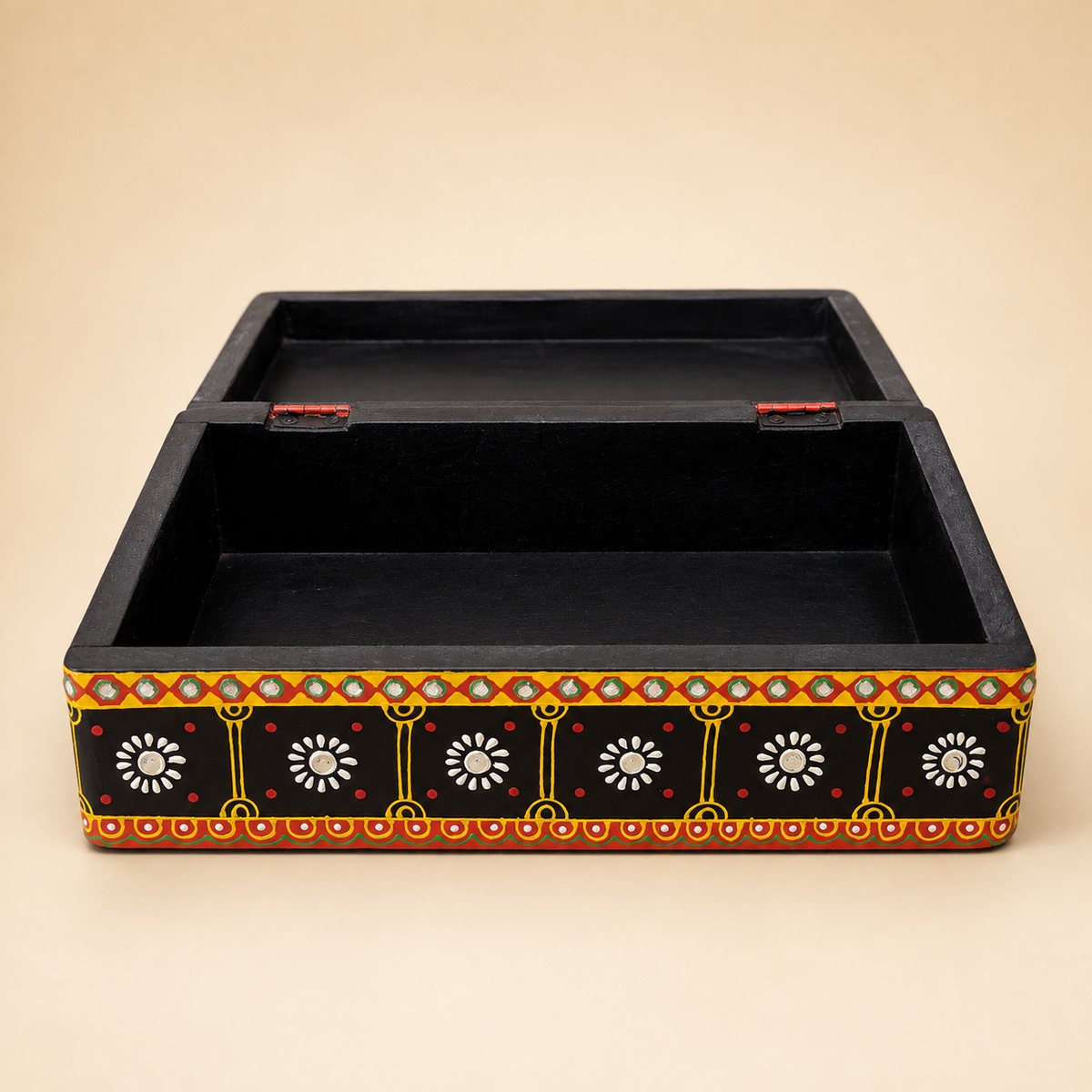 Open Rang Jyoti keepsake box showing its hinged lid and single black compartment