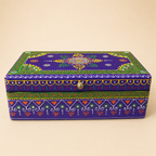 Rang Leela purple and green keepsake box with colourful floral motifs, mirror accents and a round metal knob
