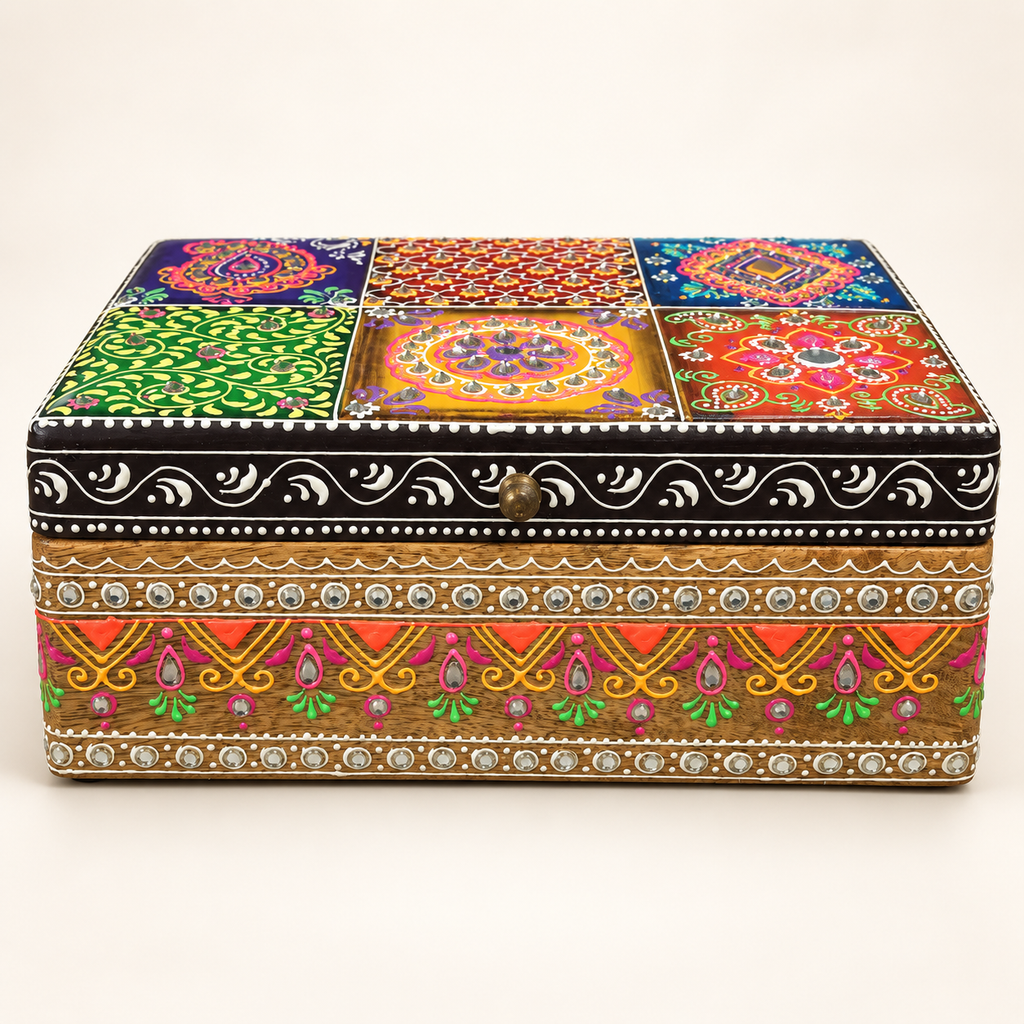 Rang Mahal decorative storage box with six colourful patterned lid panels and a black and white scroll border