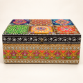 Rang Mahal decorative storage box with six colourful patterned lid panels and a black and white scroll border