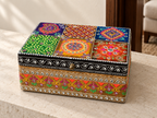Rang Mahal decorative storage box displayed on a stone console