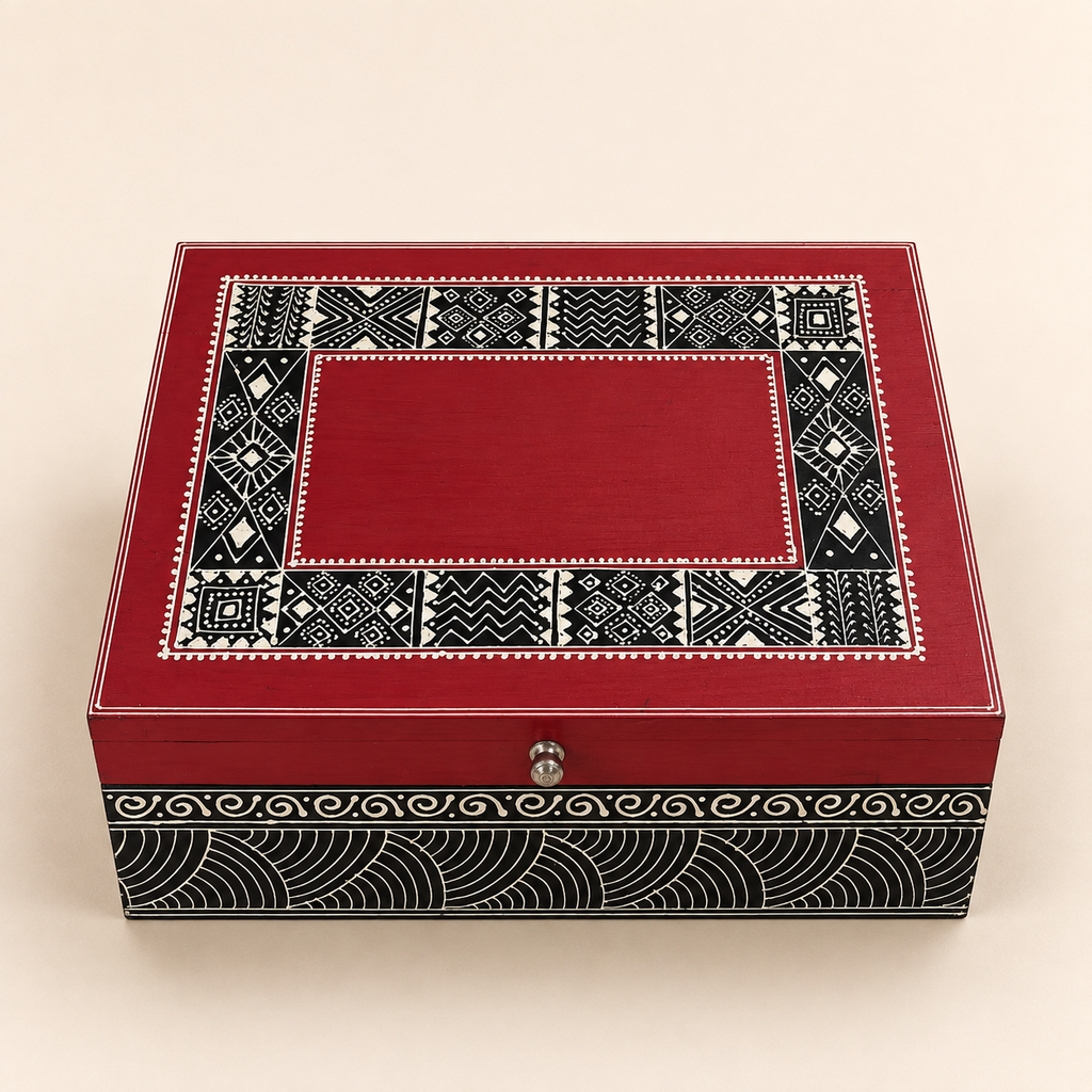 Top view of the red Rang Rekha keepsake box with black and cream patterned border
