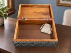 Open Rang Rekha keepsake box on a wooden desk, styled with an ivory pouch